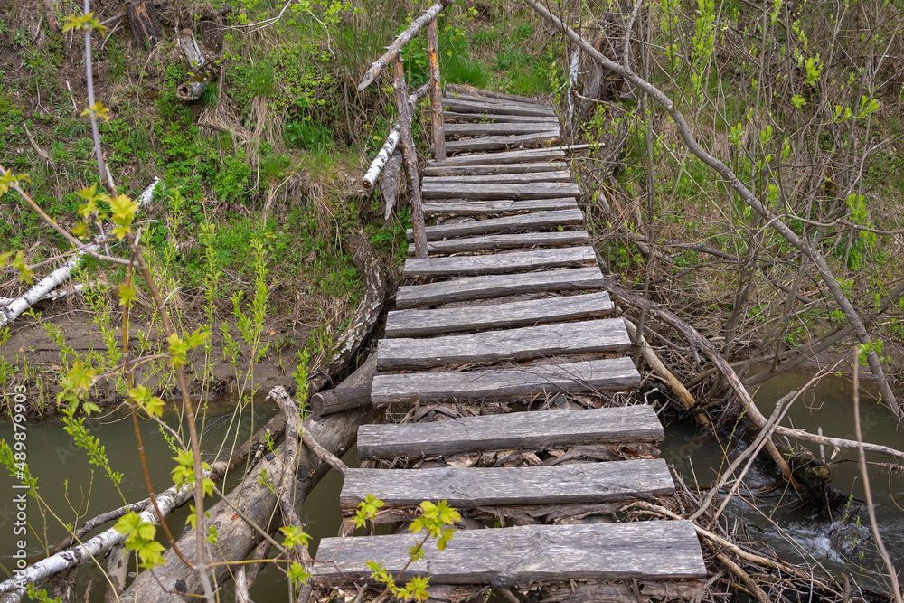 Pedestrian bridge over a small river Itkara Pedestrian bridge over a small river Itkara