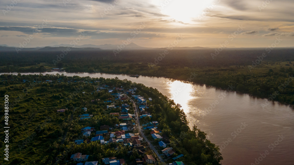 Aerial photo of sunset over the river at the rural village