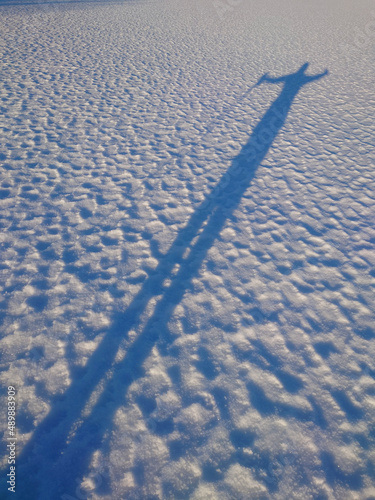 Human shadow on the snow
