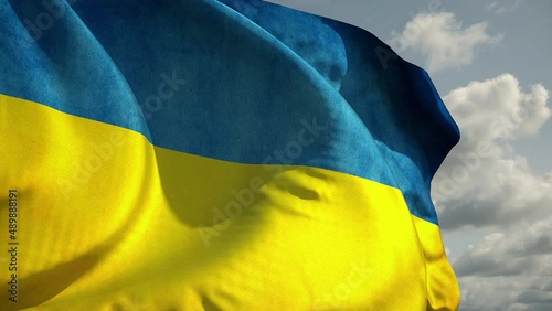 Slow motion of Ukrainian flag wind waving against the sky. Blue and yellow national symbol of Ukraine. Concept of peace and support of Ukraine against Russian agression and war. Highly detailed 4k