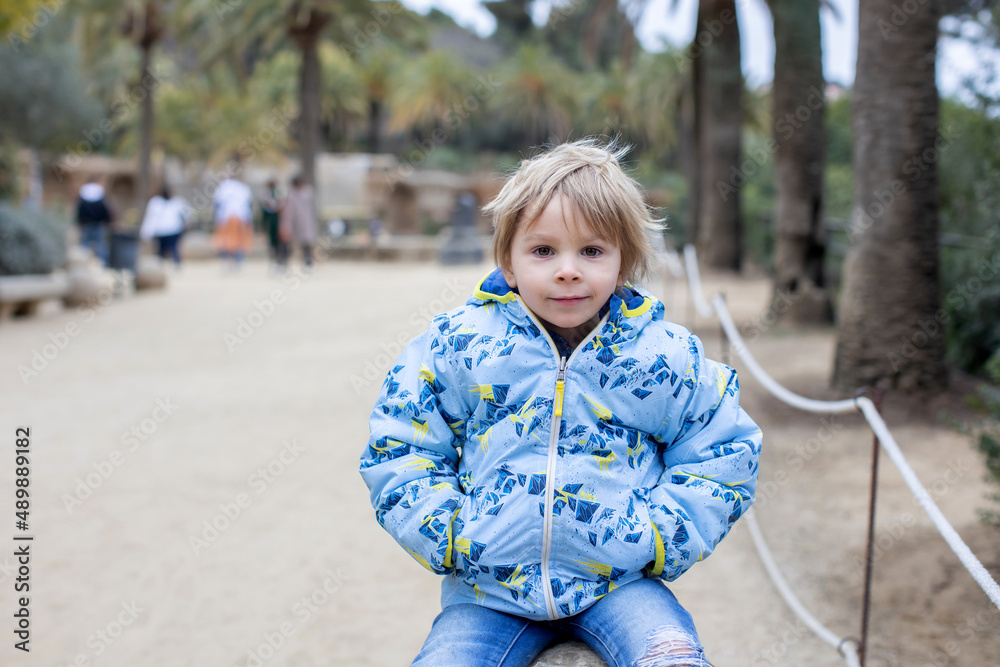 Child, posing in park Guell in Barcelona Child, posing in park Guell in Barcelona