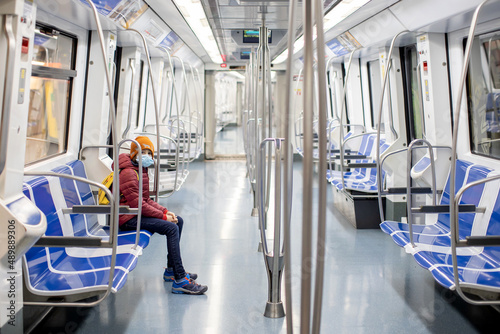 Photography Children, traveling on the subway early in the morning, empty train, Barcelona