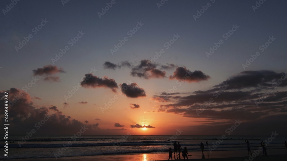 sunset over the sea, kuta beach, bali