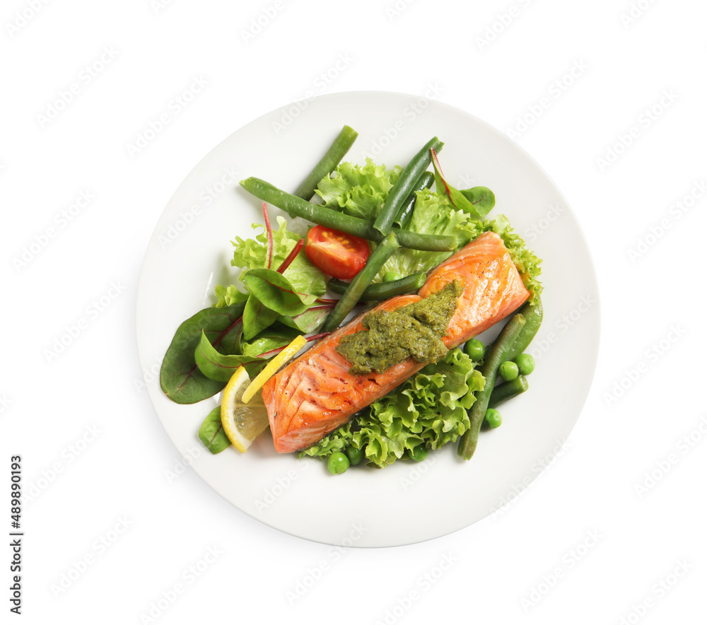 Tasty cooked salmon with pesto sauce and fresh salad on white background, top view Tasty cooked salmon with pesto sauce and fresh salad on white background, top view