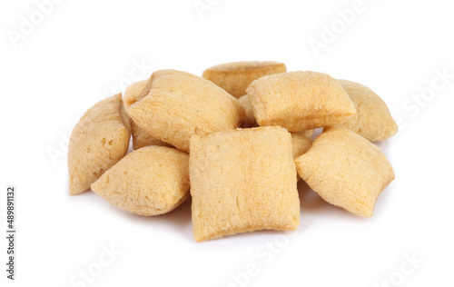 Heap of sweet crispy corn pads on white background. Breakfast cereal