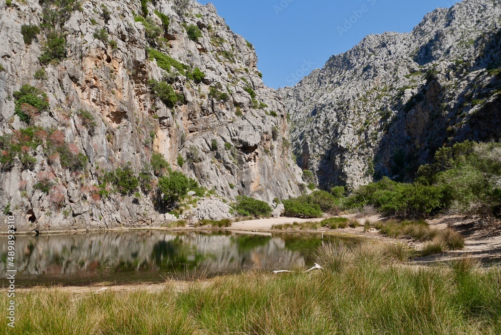 Rugged cliffs of canyon Torrent de Pareis, in the hinterland of Cala Sa Calobra. Majorca, Spain. Rugged cliffs of canyon Torrent de Pareis, in the hinterland of Cala Sa Calobra. Majorca, Spain.