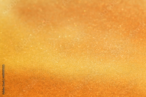 Bright golden blurred background with thin focus line