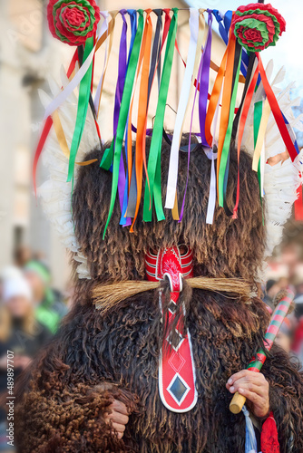 Colorful face of Kurent, Slovenian traditional mask, carnival time. Traditional mask used in februar for winter persecution, carnival time, Slovenia. photo