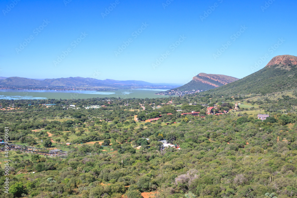 Hartbeespoort Dam surrounded by urban area, Magaliesberg mountain, North West Province, South Africa Hartbeespoort Dam surrounded by urban area, Magaliesberg mountain, North West Province, South Africa