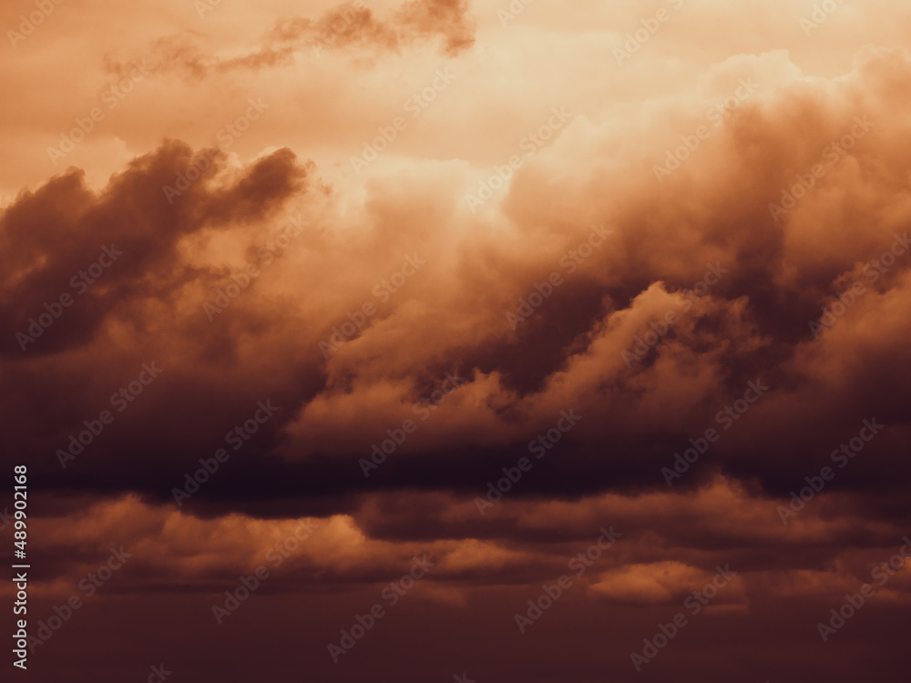 Storm sky with dark grey cumulus clouds.  Thunderstorm