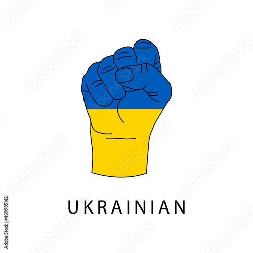 Hand clenched into a fist in the colors of the Ukrainian flag. The concept of a military invasion of Ukraine. No war