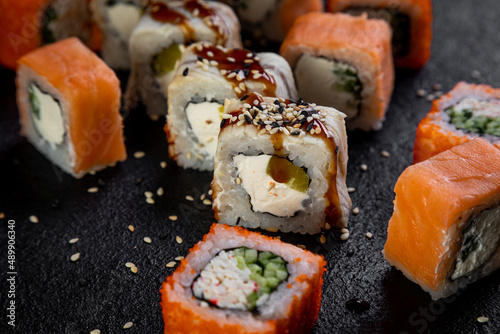 traditional japanese sushi dish, rolls. Sushi on a dark background