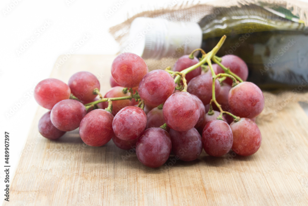 Bunch of red grapes closeup, sweet grapes with clipping path Bunch of red grapes closeup, sweet grapes with clipping path