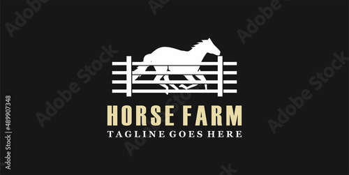 Horse stable vintage design logo for western countryside retro rural farm logo design. Horse silhouette behind wooden fence paddock for vintage retro rustic countryside western country farm ranch logo