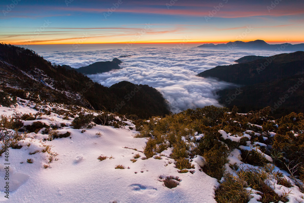 Fototapeta premium Asia - Beautiful landscape of highest mountains reflect fantasy dramatic sunset sky in winter at Taroko National Park, Hehuan Mountain, Taiwan 