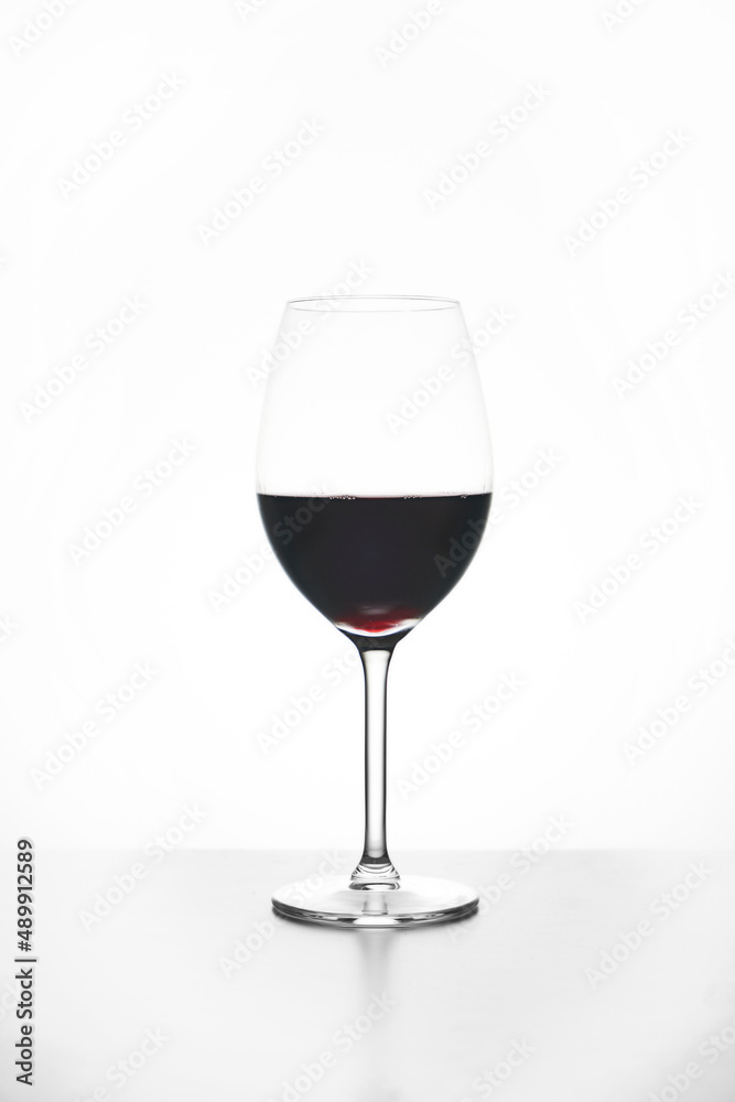 Glass of red wine isolated on white Glass of red wine isolated on white