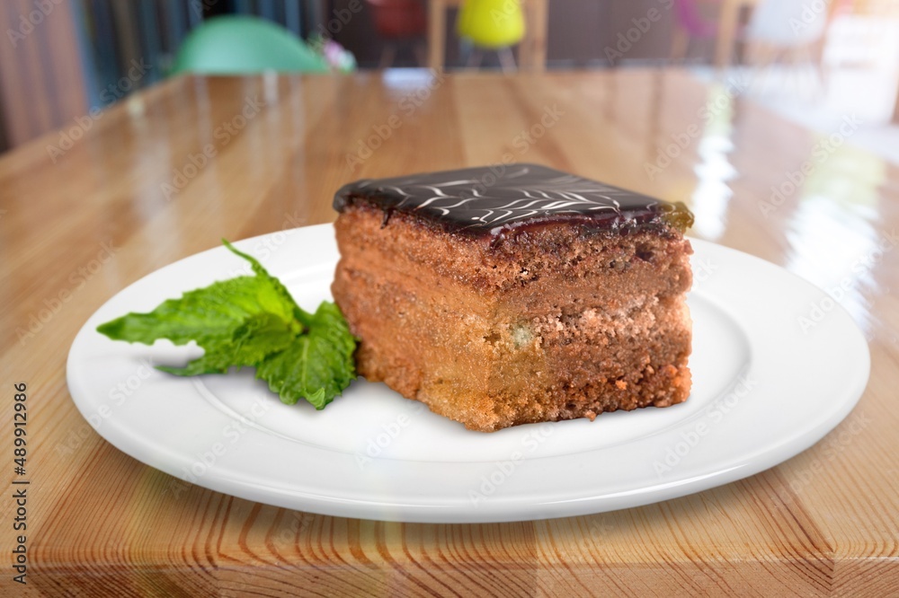 Tasty cake chocolate slice on a plate