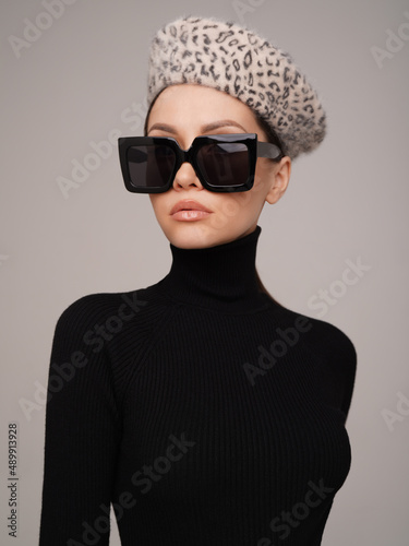 Beautiful young lady in a black turtleneck