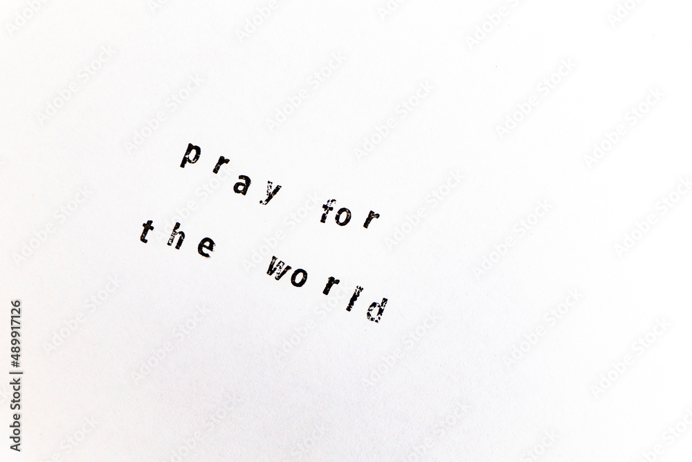 Pray for the world machine stamps on a white paper background Pray for the world machine stamps on a white paper background