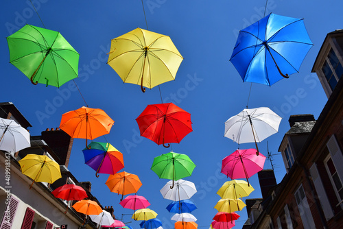 Les Andelys  France - july 2 2019   umbrellas in a street
