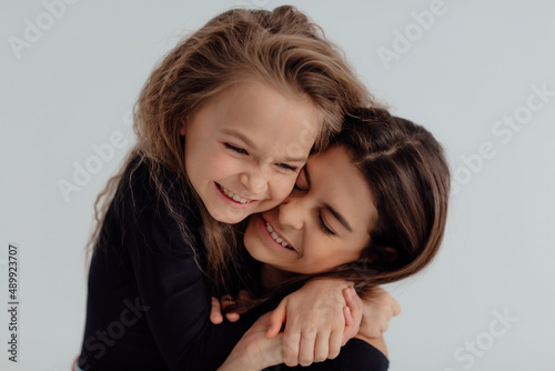 Ukrainian happy sisters hug each other. Concept of love and peace photo