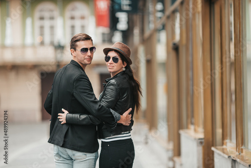 Europe travel tourists couple walking in old streets of the city © travnikovstudio