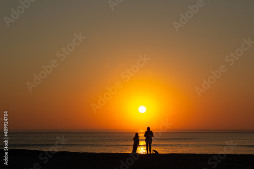 Looking at sunset. Barra beach, Aveiro, Portugal