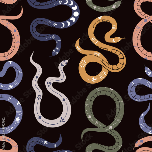 Seamless pattern with colorful snakes on a black background.