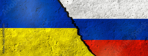 War and peace concept. Russian and Ukrainian flag. International conflict over Ukraine. Ukrainian-Russian millitary crises.