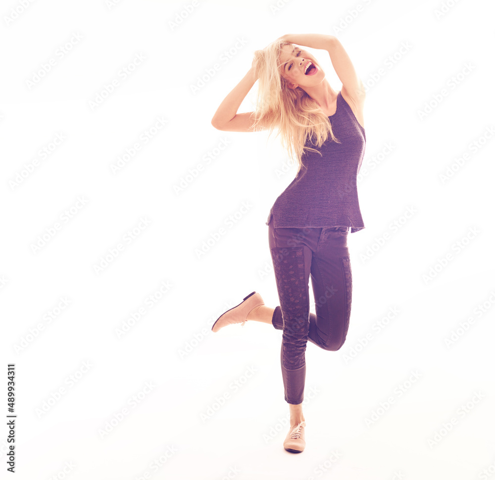 Letting loose and being myself. Full length studio shot of a lively fashionable young woman. Letting loose and being myself. Full length studio shot of a lively fashionable young woman.