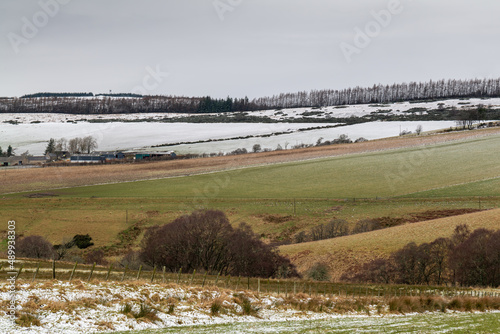 16 February 2022. A920 Huntly to Dufftown Road, Moray, Scotland. This is the view showing how the snow was only lasting on the higher ground in Moray. photo