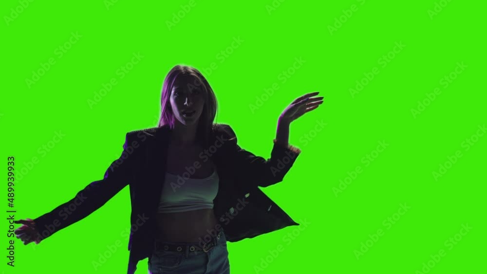 A girl is entertaining the crowd with her beautiful dance greenscreen A girl is entertaining the crowd with her beautiful dance greenscreen