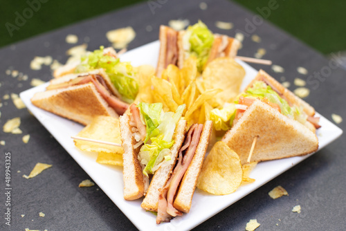variety of sandwich with crisps