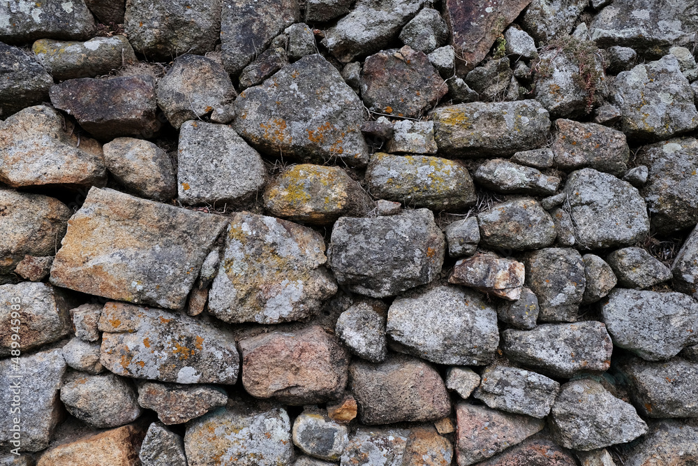 Wall built with stones of different sizes Wall built with stones of different sizes