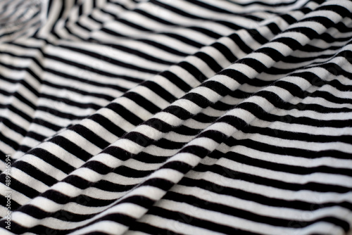 Black and white stripes fabric cloth abstract background, close-up