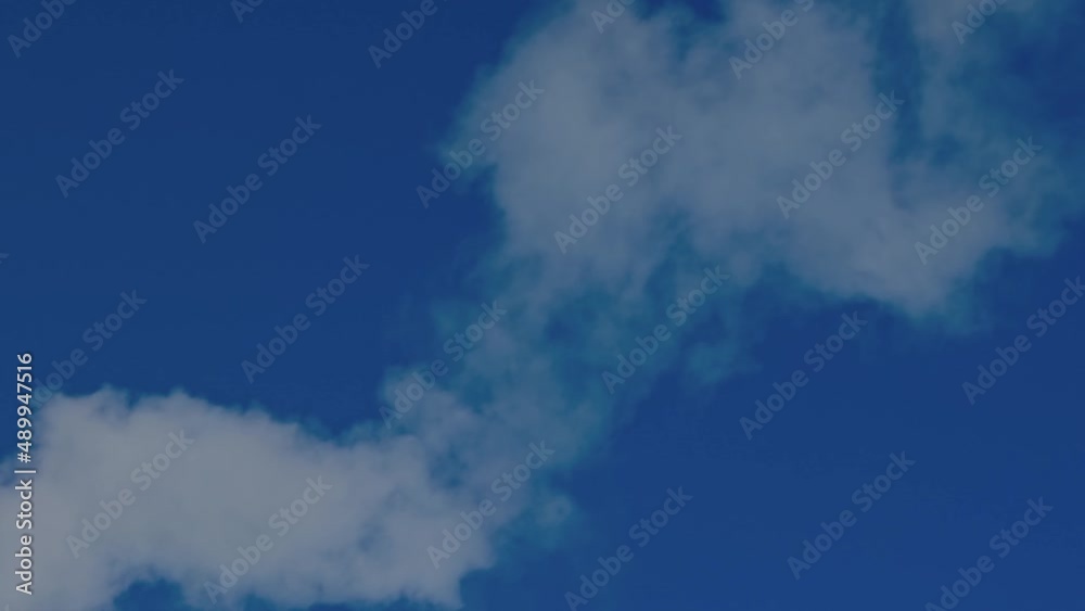 View of smoke coming out of chimney against blue sky. Ecology and greenhouse effect concept. Sweden. View of smoke coming out of chimney against blue sky. Ecology and greenhouse effect concept. Sweden.