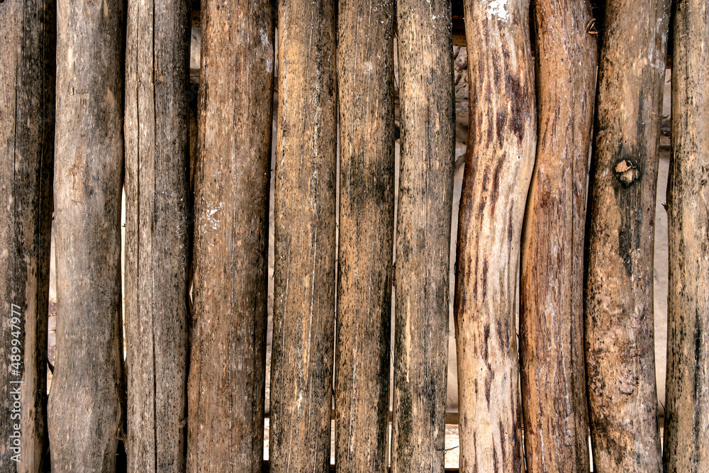 Vertically wooden logs wall texture background Vertically wooden logs wall texture background