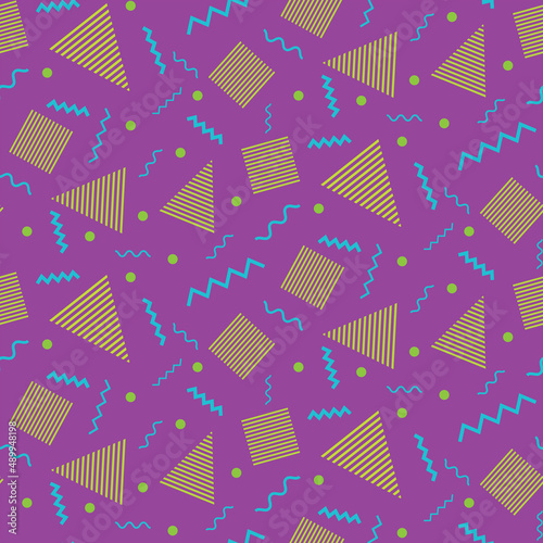 Abstract geometric shapes seamless pattern in yellow and blue over neon pink background in 90s fashion style. Great for posters, website background, gift wrapping paper  and 90s party theme 