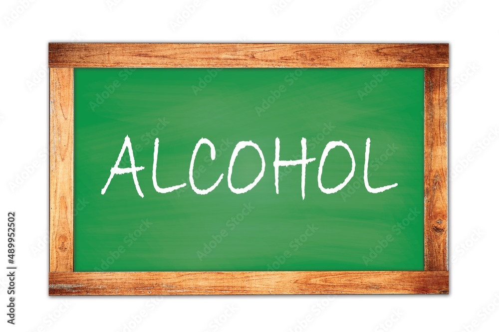 ALCOHOL text written on green school board. ALCOHOL text written on green school board.