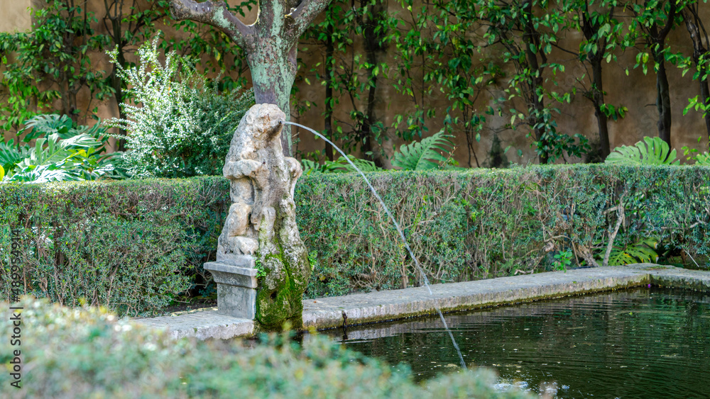 Fountain in baroque style gardens in the alcázar of Seville Fountain in baroque style gardens in the alcázar of Seville