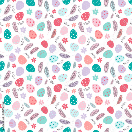 Background with Easter eggs and spring flowers. 