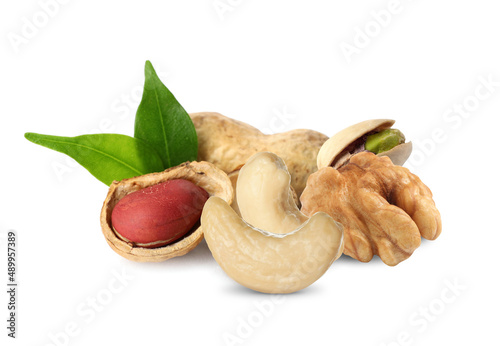 Mix of tasty organic nuts on white background