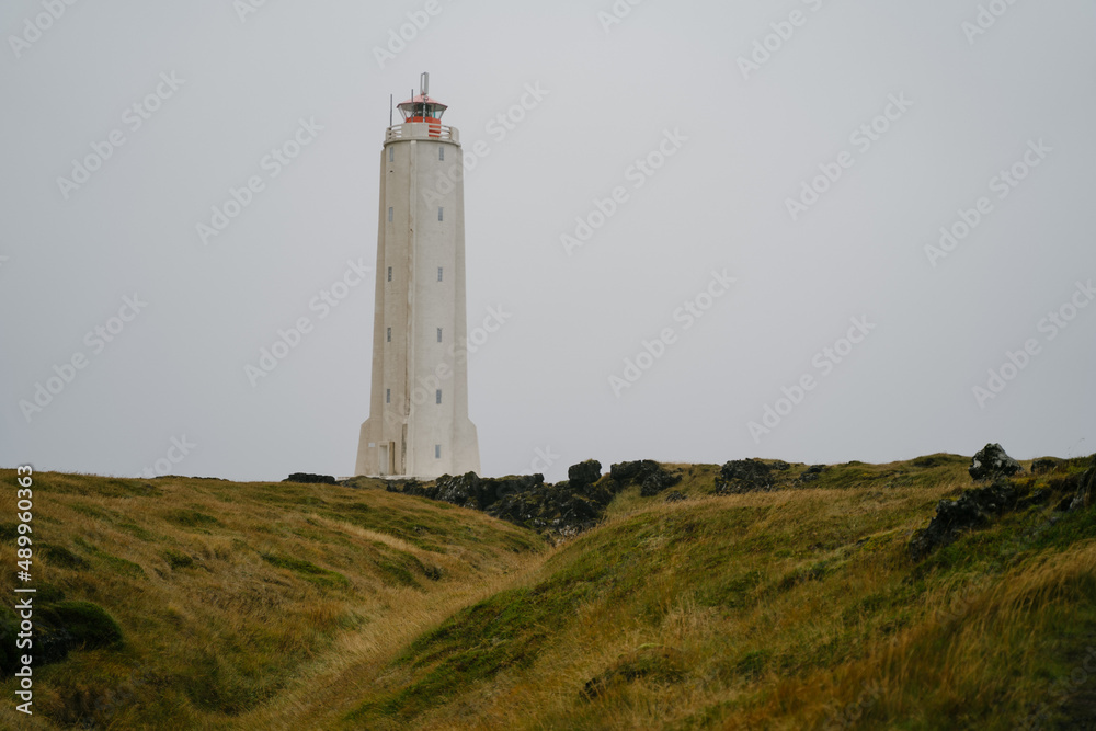 Malarrif lighthouse on the cliff near the ocean in Western Iceland. Snaefellsnes (Snæfellsnes) peninsula