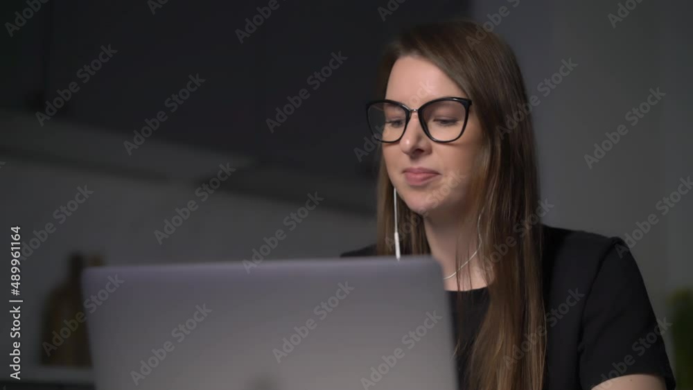 Person using the laptop. Woman working on computer. Person using the laptop. Woman working on computer.