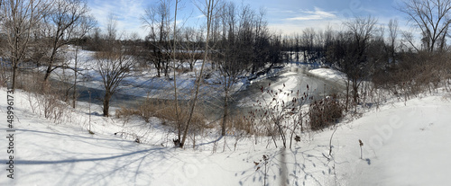 Panoramic view of the Turtle River in Delson Quebec in winter.