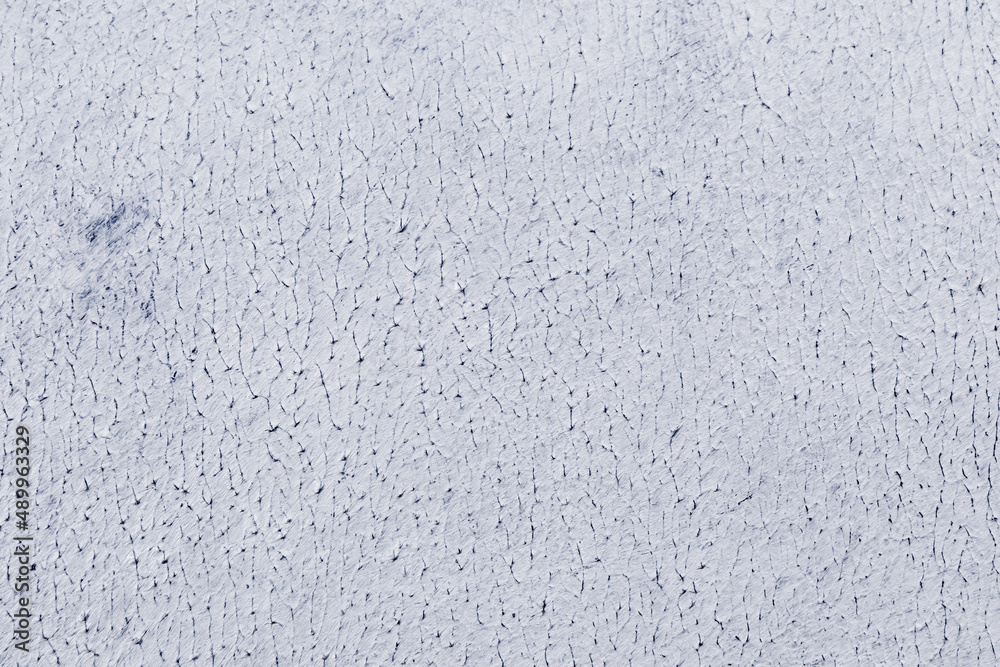 Obraz premium white uneven rough background with weak toning