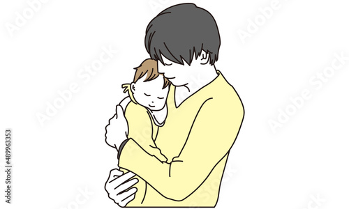 眠る赤ちゃんと抱っこするお父さん