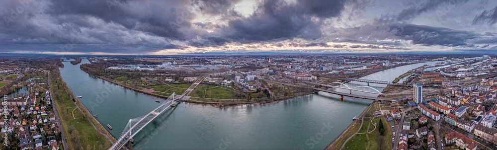 Drone panorama over the Rhain and the French city of Strasbourg during the day with cloudy sky