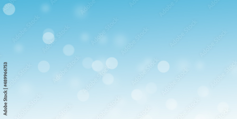 Blue and white bokeh lights image. Sparkling circles abstract background, defocused background