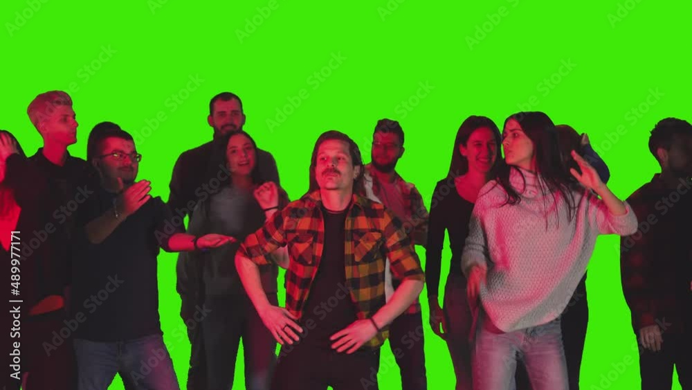 A crowd is dancing together in a concert on greenscreen A crowd is dancing together in a concert on greenscreen